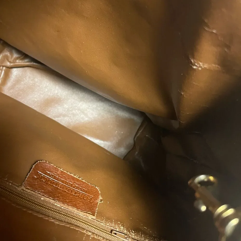 Fortune Duck vintage leather Brown sling back bucket style  bag.